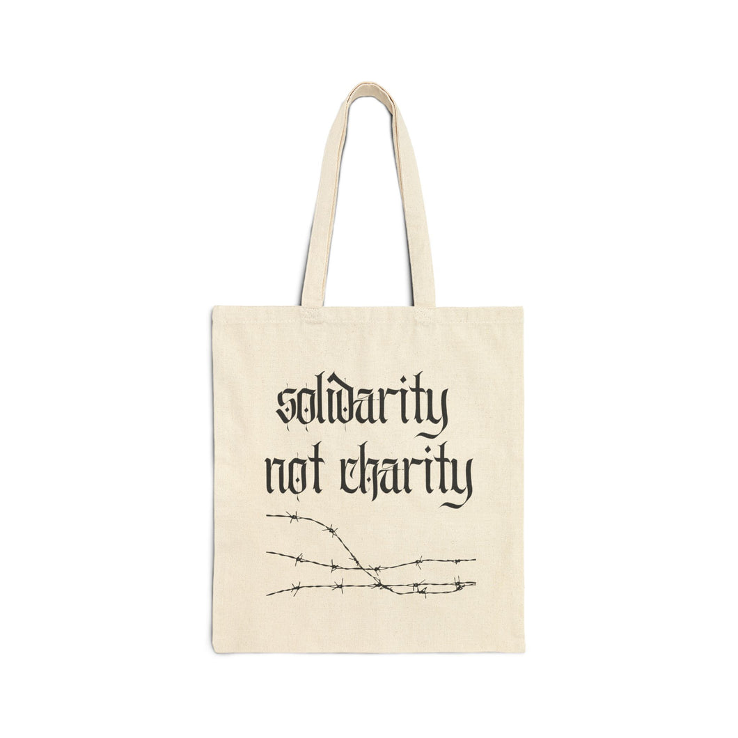 Solidarity Not Charity Tote Bag